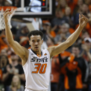 Oklahoma State holds out star guard Jeffrey Carroll amid eligibility concerns