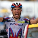 Joaquim Rodriguez of Spain celebrates as he crosses the finish line to win the 195-km (121.16 miles) 12th stage of the 102nd Tour de France cycling race from Lannemezan to Plateau de Beille, in the French Pyrenees mountains, France, July 16, 2015. REUTERS/Eric Gaillard