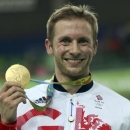 2016 Rio Olympics - Cycling Track - Victory Ceremony - Men's Keirin Victory Ceremony - Rio Olympic Velodrome - Rio de Janeiro, Brazil - 16/08/2016. Jason Kenny (GBR) of Britain poses with the gold medal.  REUTERS/Matthew Childs