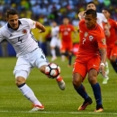 Jun 22, 2016; Chicago, IL, USA; Colombia defender Santiago Arias (4) and Chile forward Alexis Sanchez (7) fight for the ball during the first half in the semifinals of the 2016 Copa America Centenario soccer tournament at Soldier Field. Mandatory Credit: Mike DiNovo-USA TODAY Sports