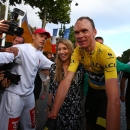 Britain's Chris Froome celebrates with his wife Michelle after winning the Tour de France cycling race in Paris, France, Sunday, July 26, 2015. (AP Photo/Laurent Rebours)