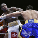 Adrien Broner, left, and Shawn Porter battle during a welterweight fight on Saturday, June 20, 2015, in Las Vegas. Porter won by an unanimous decision after a 12-round bout. (AP Photo/David Becker)