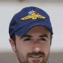 James Hinchcliffe, of Canada, poses for a photo after his qualification run on the first day of qualifications for Indianapolis 500 IndyCar auto race at the Indianapolis Motor Speedway in Indianapolis, Saturday, May 17, 2014. (AP Photo/Dave Parker)
