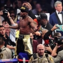 May 2, 2015; Las Vegas, NV, USA; Floyd Mayweather celebrates after defeating Manny Pacquiao (not pictured) via unanimous decision during their world welterweight championship bout at MGM Grand Garden Arena. Mandatory Credit: Joe Camporeale-USA TODAY Sports