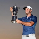 Jun 19, 2016; Oakmont, PA, USA; Dustin Johnson poses for a photo with the championship trophy after winning the U.S. Open golf tournament at Oakmont Country Club. Mandatory Credit: John David Mercer-USA TODAY Sports