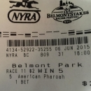 This photo taken Saturday, June 6, 2015, shows a $2 betting ticket on American Pharoah to win the Belmont Stakes horse race at Belmont Park in Elmont, N.Y. A $2 ticket on American Pharoah to win the Belmont Stakes may be worth a lot more money later than now. Or, people are hanging on to their own little piece of horse racing history. Two days after he became the first Triple Crown winner in 37 years, more than 95 per cent of those who spent two bucks on a win ticket have yet to cash them. And for those still considering what to do, your deadline is March 31, 2016, or the money is returned to the state. (AP Photo/Simmi Buttar)