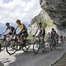 Wout Poels of the Netherlands, left, Britain's Chris Froome, wearing the overall leader's yellow jersey, and Robert Gesink of the Netherlands, front right, climb during the nineteenth stage of the Tour de France cycling race over 138 kilometers (85.7 miles) with start in Saint-Jean-de-Maurienne and finish in La Toussuire, France, Friday, July 24, 2015. (AP Photo/Laurent Cipriani)