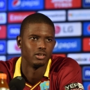 The West Indies' captain Jason Holder speaks at a press conference in Sydney, on February 8, 2015, ahead of their ICC Cricket World Cup Pool B opening match against Ireland (AFP Photo/Peter Parks)