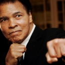 Muhammad Ali poses at the 2006 World Economic Forum in Davos. REUTERS/Andreas Meier