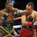 Nicholas Walters, left, battles Nonito Donaire in the second round during a WBA featherweight title boxing fight, Saturday, Oct. 18, 2014, in Carson, Calif. Walters won in the sixth round. (AP Photo/Alex Gallardo)