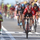 Germany's Andre Greipel, right, crosses the finish line ahead of second place Peter Sagan of Slovakia, left, to win the second stage of the Tour de France cycling race over 166 kilometers (103 miles) with start in Utrecht and finish in Neeltje Jans, Netherlands, Sunday, July 5, 2015. (AP Photo/Peter Dejong)