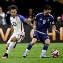 Jun 21, 2016; Houston, TX, USA; Argentina midfielder Lionel Messi (10) kicks the ball as United States defender Fabian Johnson (23) defends during the first half in the semifinals of the 2016 Copa America Centenario soccer tournament at NRG Stadium. Kevin Jairaj-USA TODAY Sports