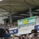 Jockey Tony McCoy tours the parade ring after he received the champion jump jockey's trophy, which he has been given permanently, before the last races of his career at at Sandown Park racecourse, London, Saturday, April 25, 2015. McCoy was champion jump jockey for the 20th consecutive year. (AP Photo/Tim Ireland)