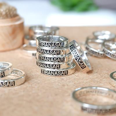 couple rings with engraved names