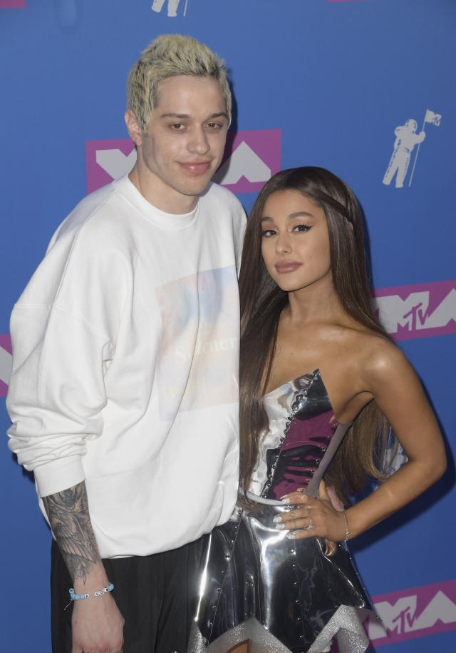 Pete Davidson and Ariana Grande pose on the red carpet.  (imageSPACE/MediaPunch/IPx)