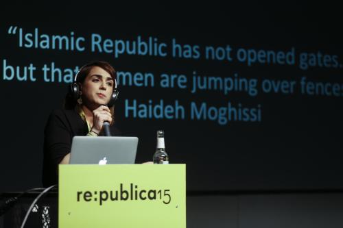 Internet researcher Mahsa Alimardani delivers her presentation at the international internet and society conference 're-publica' in Berlin, Germany, Thursday, May 7, 2015. Two researchers have found that Iranian censors are struggling to block Instagram photos of Justin Bieber and Kim Kardashian as the service gains popularity in their country. (AP Photo/Markus Schreiber)