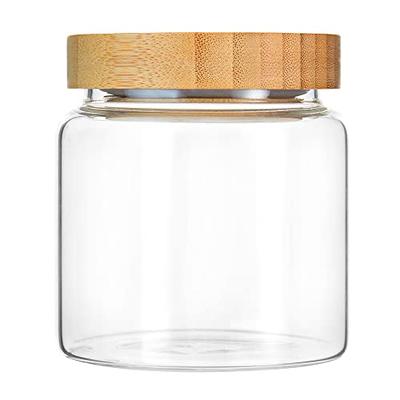 Small glass storage jar with bamboo lid