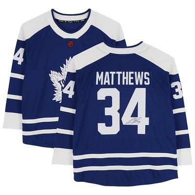 Auston Matthews Toronto Maple Leafs Unsigned Blue Reverse Retro Jersey Goal Celebration Photograph