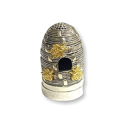 Sewing pin holder with thimble Stock Photo