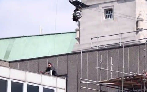 Tom Cruise collides with the building after missing his landing