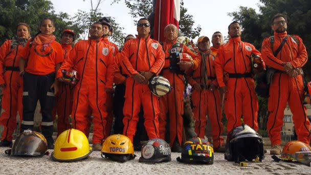 PHOTO: Rescuers known as 'Los Topos' perform an honor guard to commemorate the 32nd anniversary of the 8.0 magnitude earthquake that occurred on September 19, 1985, in Mexico City, Mexico. Moments later a 7.1 magnitude earthquake shook the area. (Sashenka Guiterrez/EPA)