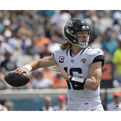 Trevor Lawrence Jacksonville Jaguars Autographed 8'' x 10'' Teal Jersey Rush Touchdown Photograph