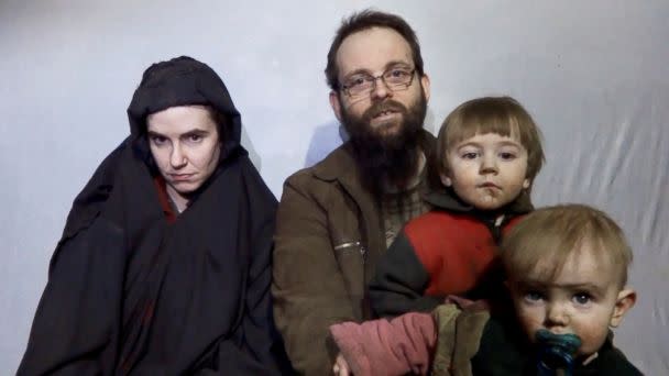 PHOTO: A still image from a video posted by the Taliban on social media, Dec. 19, 2016, shows American Caitlan Coleman next to her Canadian husband Joshua Boyle and their two sons. (Taliban/Social media via Reuters )