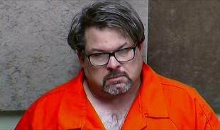 Uber driver Jason Dalton, suspected of killing six people and wounding two others, is seen on closed circuit television during his arraignment in Kalamazoo on Feb. 20. (Kalamazoo County Court/Handout via Reuters TV)
