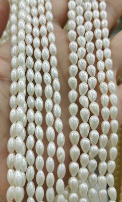 6-7mm Oval Freshwater Pearls, White (16 Strand)