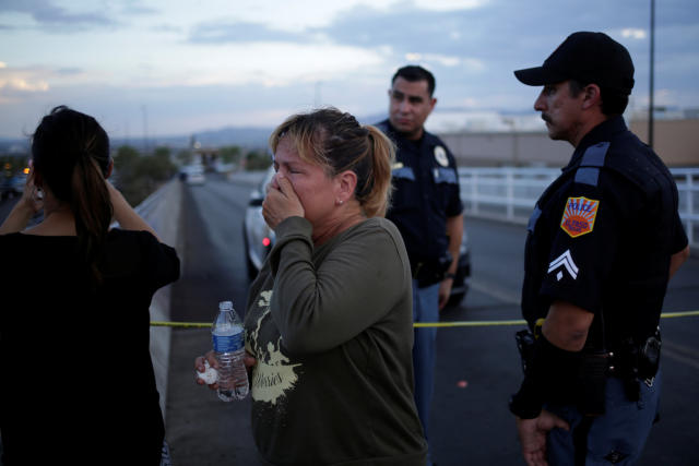 A woman reacts after a mass shooting at a Walmart in El Paso, Texas, U.S. August 3, 2019. REUTERS/Jose Luis Gonzalez