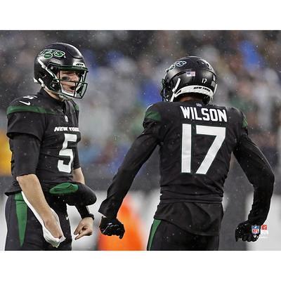 Zach Wilson New York Jets Unsigned White Jersey Passing Photograph