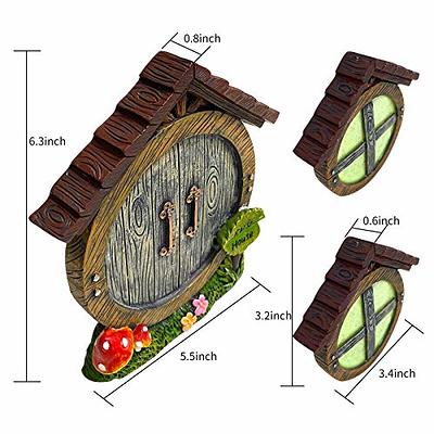 doors to the hobbit gnome house with Christmas decorations and shoes Stock  Photo