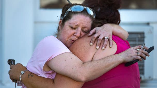 PHOTO: Carrie Matula embraces a woman after a fatal shooting at the First Baptist Church in Sutherland Springs, Texas, Nov. 5, 2017. (Nick Wagner/Statesman.com via AP)