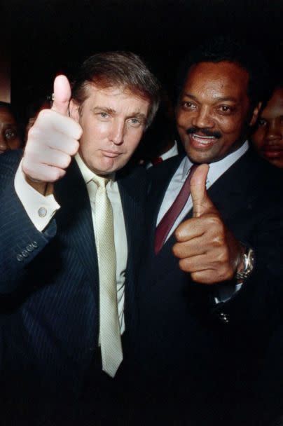 PHOTO: Donald Trump joins Jesse Jackson at a party at Trump Plaza before the Tyson-Spinks title fight in 1988. (Getty Images)