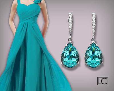 Anime Princess with Melanin Skin Blue Topaz Earrings and Blue Gown ·  Creative Fabrica