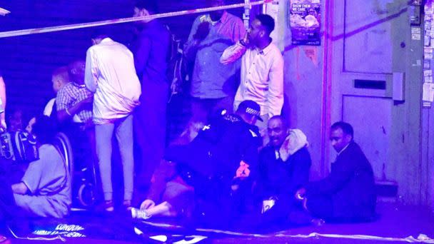 PHOTO: A first responder speaks to people at the scene of a traffic incident in Finsbury Park, London, June 18, 2017. (James Gourley/REX/Shutterstock)