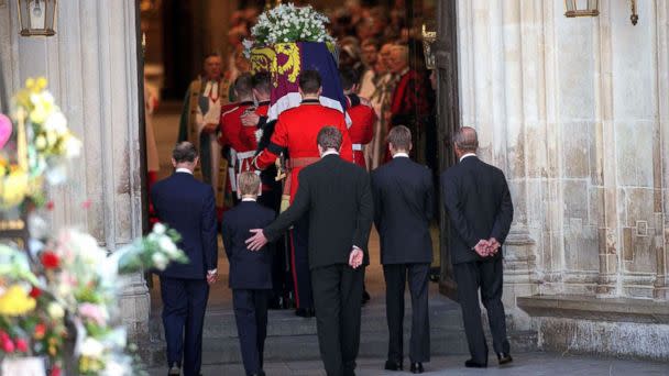 PHOTO: Earl Spencer touches Prince Harry as they follow the coffin of Diana, Princess of Wales at her funeral, Sept. 6, 1997. (Anwar Hussein/WireImage/Getty Images)