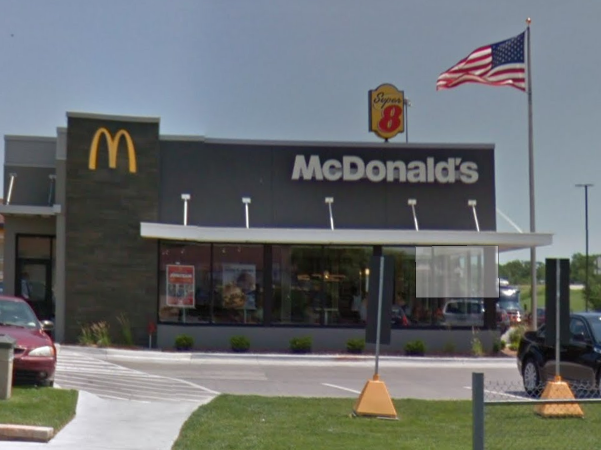 A Kansas McDonald's were accused of handing a police officer a coffee with 