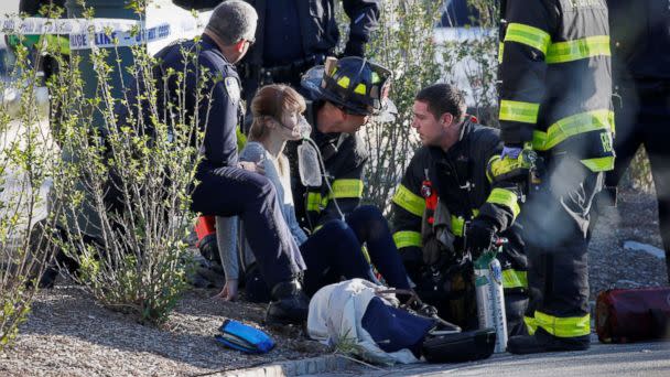 PHOTO: A woman is aided by first responders after sustaining injury on a bike path in lower Manhattan in New York, NY, Oct. 31, 2017. (Brendan McDermid/Reuters)