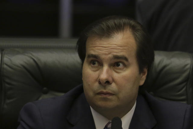 Brazil's President of the Chamber of Deputies Rodrigo Maia, looks on during a a congressional hearing before the key vote by the lower house on whether to suspend President Michel Temer and put him on trial over an alleged bribery scheme, in Brasilia, Brazil, Wednesday, Oct. 25, 2017. This is the second time Temer faces such a vote and is one more in a litany of scandals that have dogged his presidency since he replaced President Dilma Rousseff, who was impeached and removed from office last year. (AP Photo/Eraldo Peres)