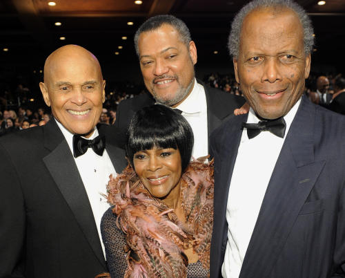 FILE - In this Feb. 17, 2012 file photo, Cicely Tyson, front center, and from left, Harry Belafonte, Laurence Fishburne and Sidney Poitier pose in the audience at the 43rd NAACP Image Awards in Los Angeles. Tyson was married to Miles Davis and shared the screen with Elizabeth Taylor. Shes won a Tony and an Emmy and been nominated for an Academy Award. But even at 90, Tyson says her lifes work isnt done. (AP Photo/Chris Pizzello, File)