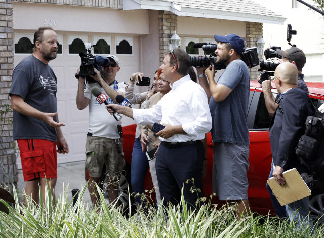 Eric Paddock, left, brother of Las Vegas gunman Stephen Paddock, speaks to members of the media outside his home, Monday, Oct. 2, 2017, in Orlando, Fla. Paddock told the Orlando Sentinel: “We are completely dumbfounded. We can’t understand what happened.” (AP Photo/John Raoux)