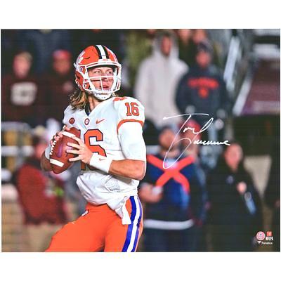 Joe Burrow LSU Tigers Unsigned White Jersey Throwing Photograph