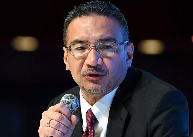 Hishammuddin said the trio have close ties with him and his family, and are currently serving him 'temporarily'. — Bernama pic