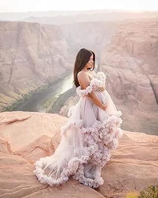 Beautiful pregnant in light white lace negligee in the bathroom