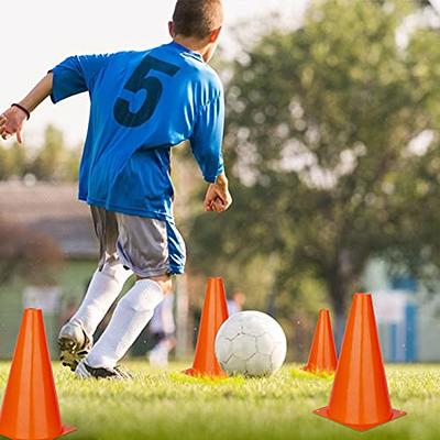 Premium Photo  Orange training cones on football field