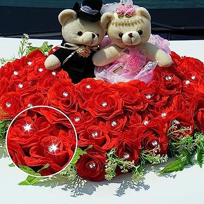 Bridal bouquet of red roses with diamond pins