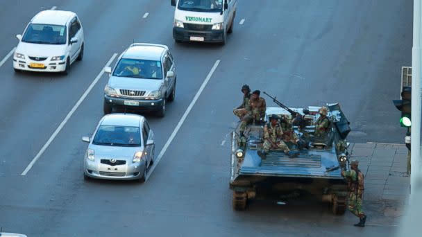 PHOTO: A military tank is seen with armed soldiers outside President Robert Mugabe's office in Harare, Nov. 15, 2017. (Tsvangirayi Mukwazhi/AP)