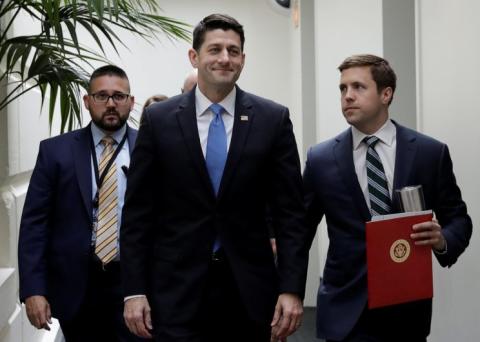 House Speaker Paul Ryan smiles as he departs a meeting at the U.S. Capitol before a vote to repeal Obamacare in Washington, D.C. (Photo: Kevin Lamarque/Reuters)