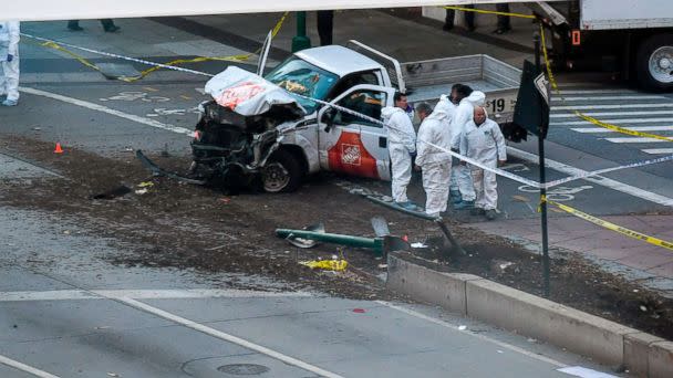 PHOTO: Investigators inspect a truck following an incident in New York City, Oct. 31, 2017. Several people were killed and numerous others injured in New York when a suspect plowed a vehicle into a bike and pedestrian path in Lower Manhattan. (Don Emmert/AFP/Getty Images)